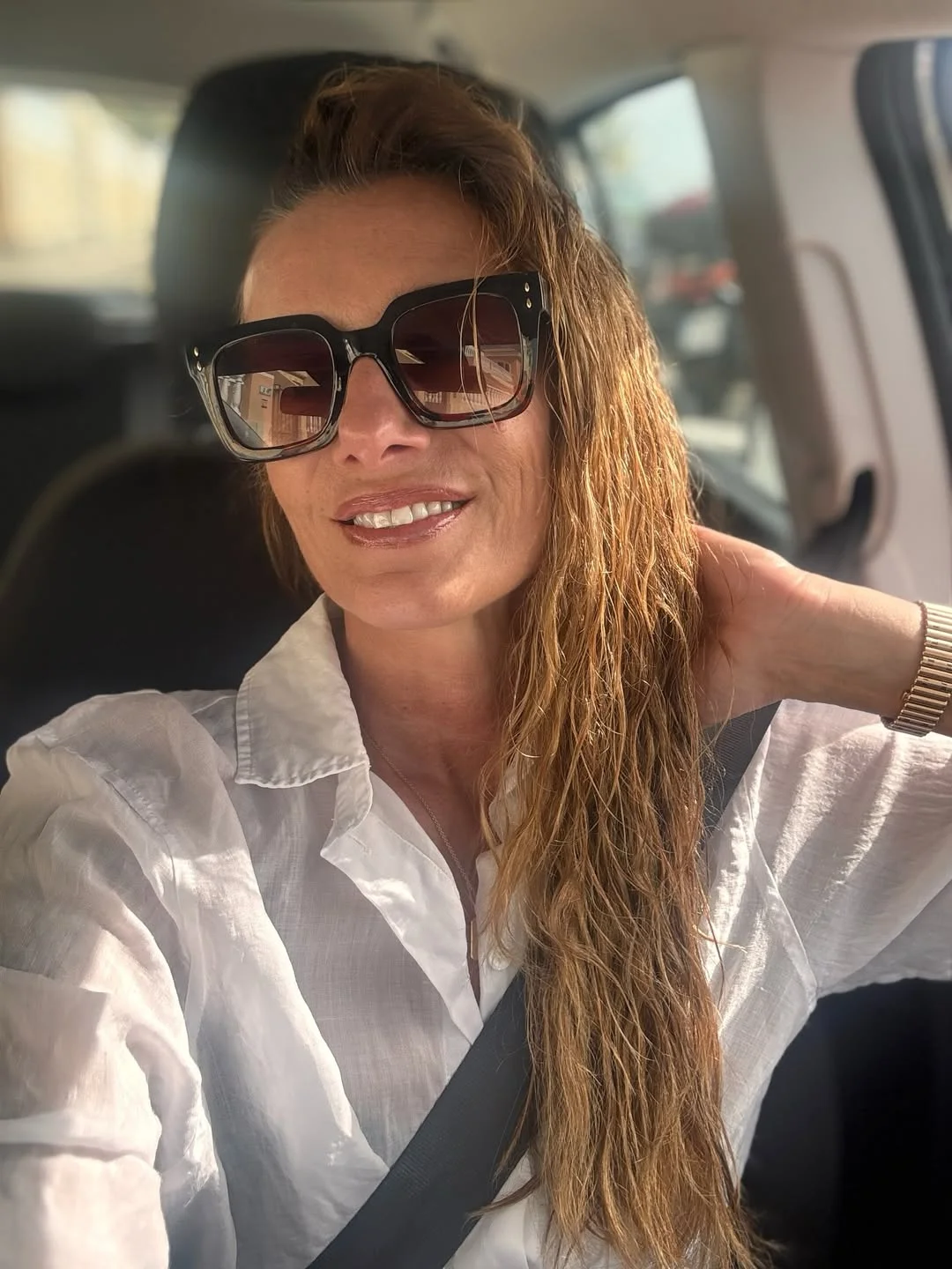 Photo by Alice Bendova on February 19, 2026. May be a selfie of one or more people, blonde hair, sunglasses, seatbelt and text.