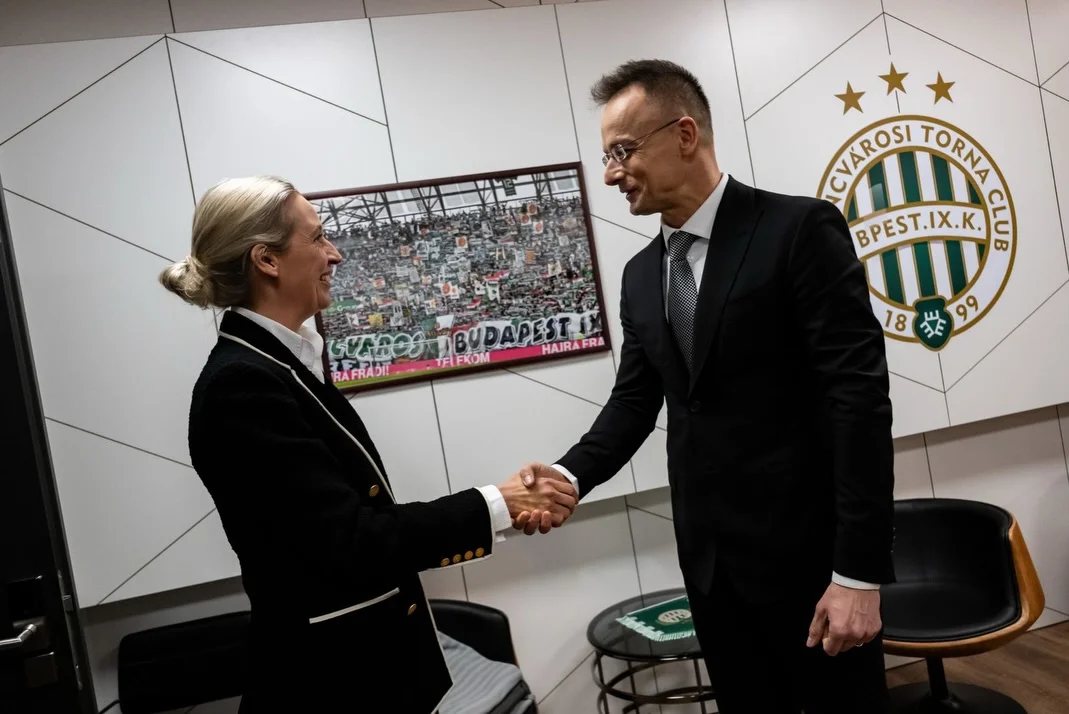 Photo by Alice Weidel on February 17, 2026. May be an image of ‎soccer, football, stadium and ‎text that says '‎CVAROSI CVAROSITORNA ም TORNA TORNA CVAROSI BPEST.IX.K. BPEST. W 99 CLUB 18 18张99 3E GVAROO TELEKOM BUDAPESTE ခ AIR FRA HAIRAFRA HAIRA RAFRABIT ه‎'‎‎.