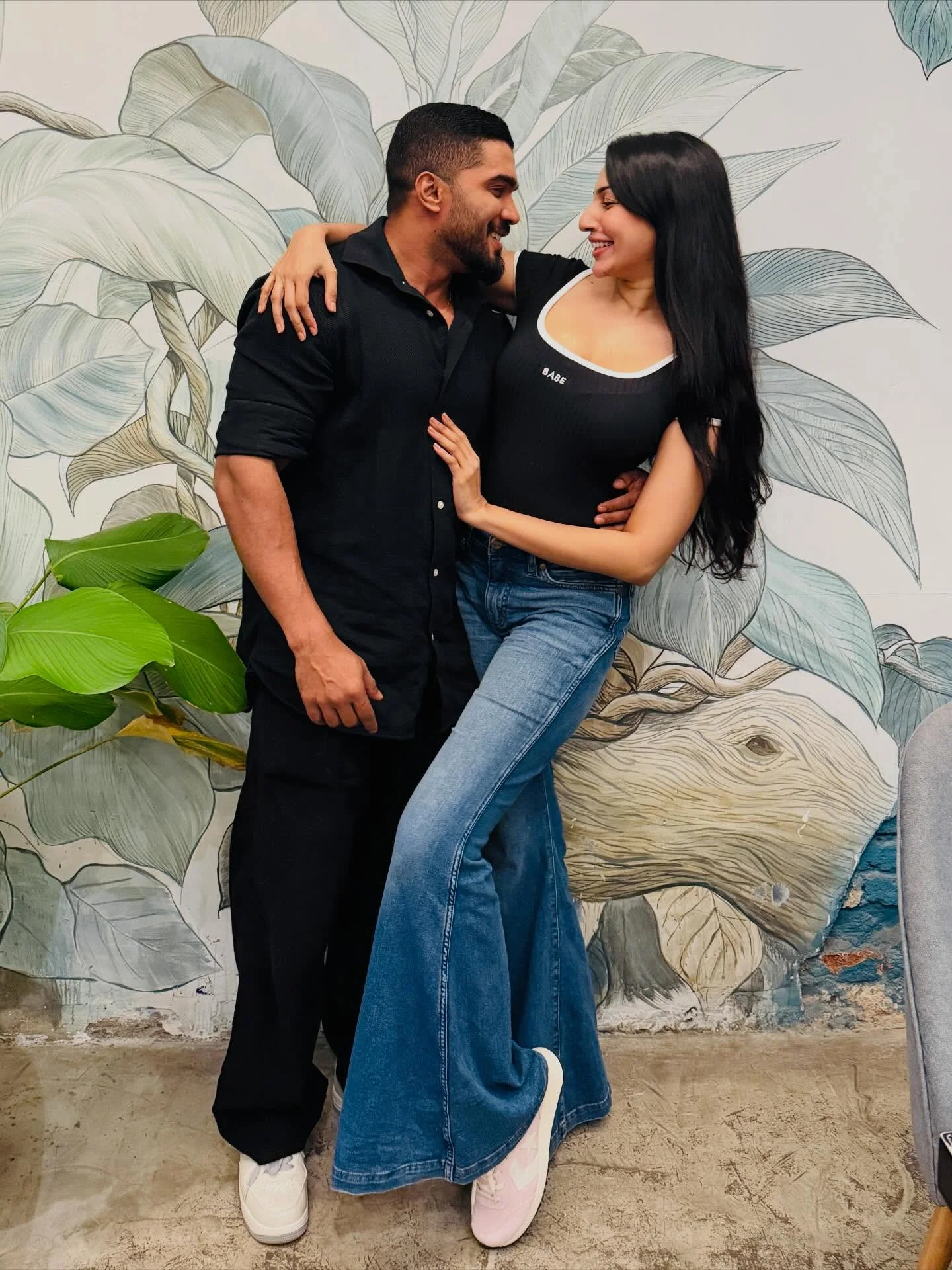 Photo by Amanda Silva on February 16, 2026. May be an image of one or more people, people smiling, people kissing and text.