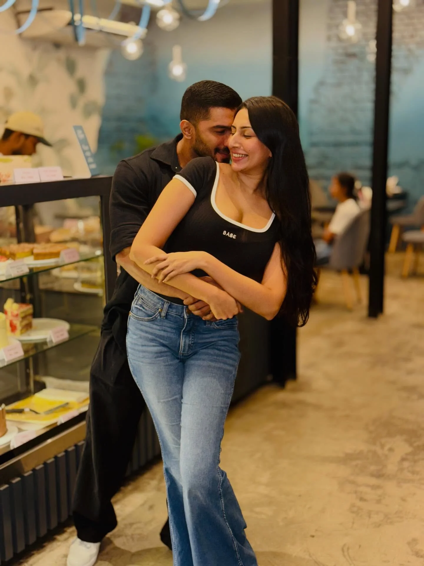 Photo by Amanda Silva on February 16, 2026. May be an image of one or more people, people kissing and text.