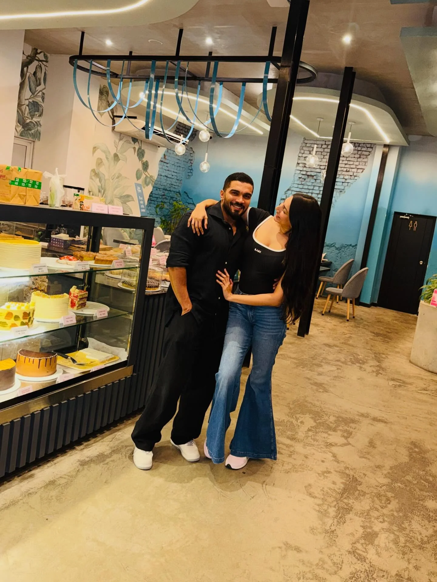 Photo by Amanda Silva on February 16, 2026. May be an image of one or more people, people kissing and text.