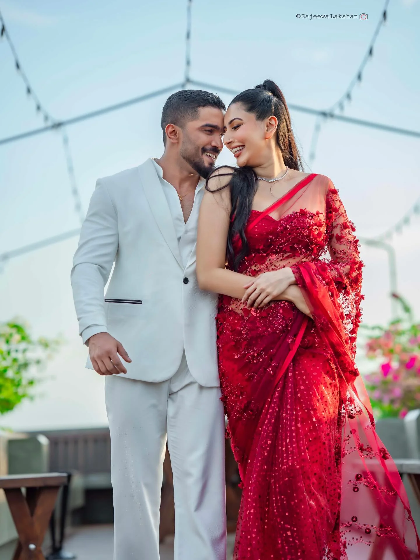 Photo by Amanda Silva on February 14, 2026. May be an image of one or more people, dress, wedding, outdoors and text.