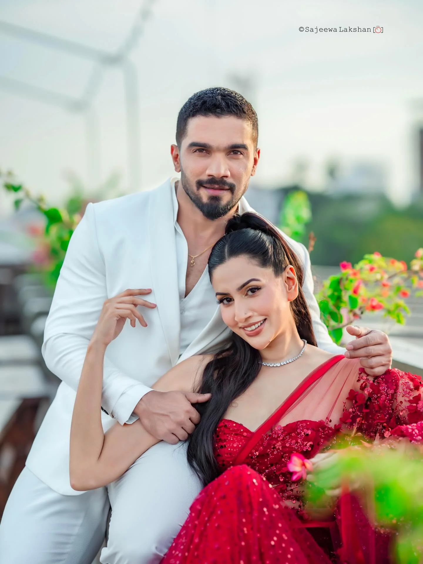 Photo by Amanda Silva on February 14, 2026. May be an image of one or more people, makeup, people smiling, dress, wedding, outdoors and text.