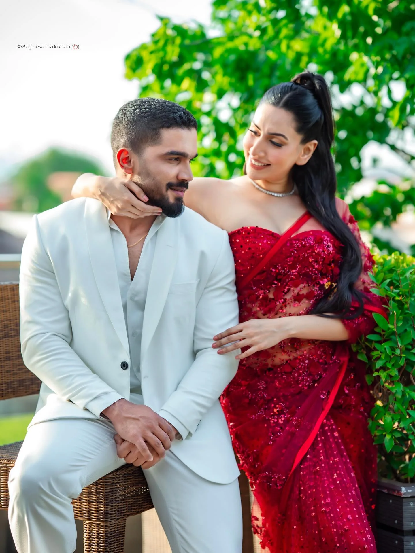 Photo by Amanda Silva on February 14, 2026. May be an image of one or more people, beard, dinner jacket, dress, wedding, outdoors and text.